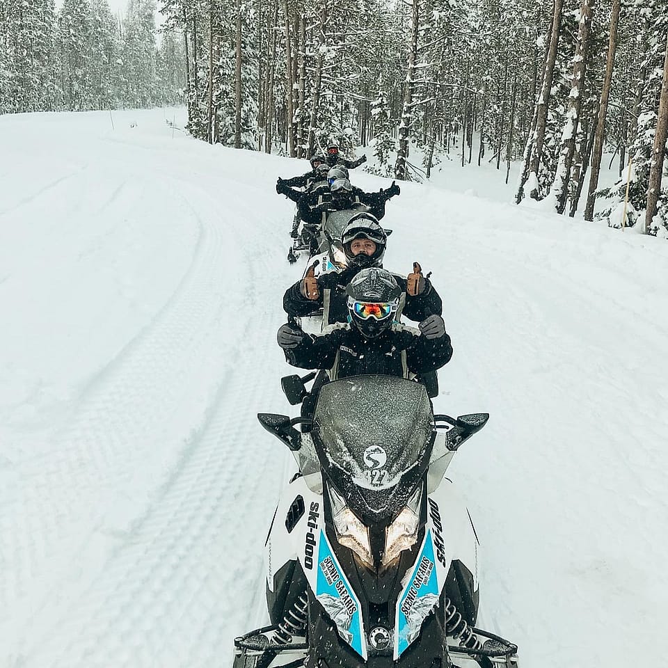 private snowmobile tour yellowstone